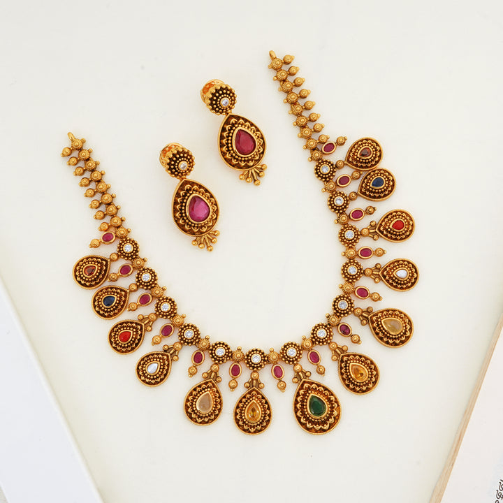 Navaratnam Necklace with Studs in Antique Gold Plated