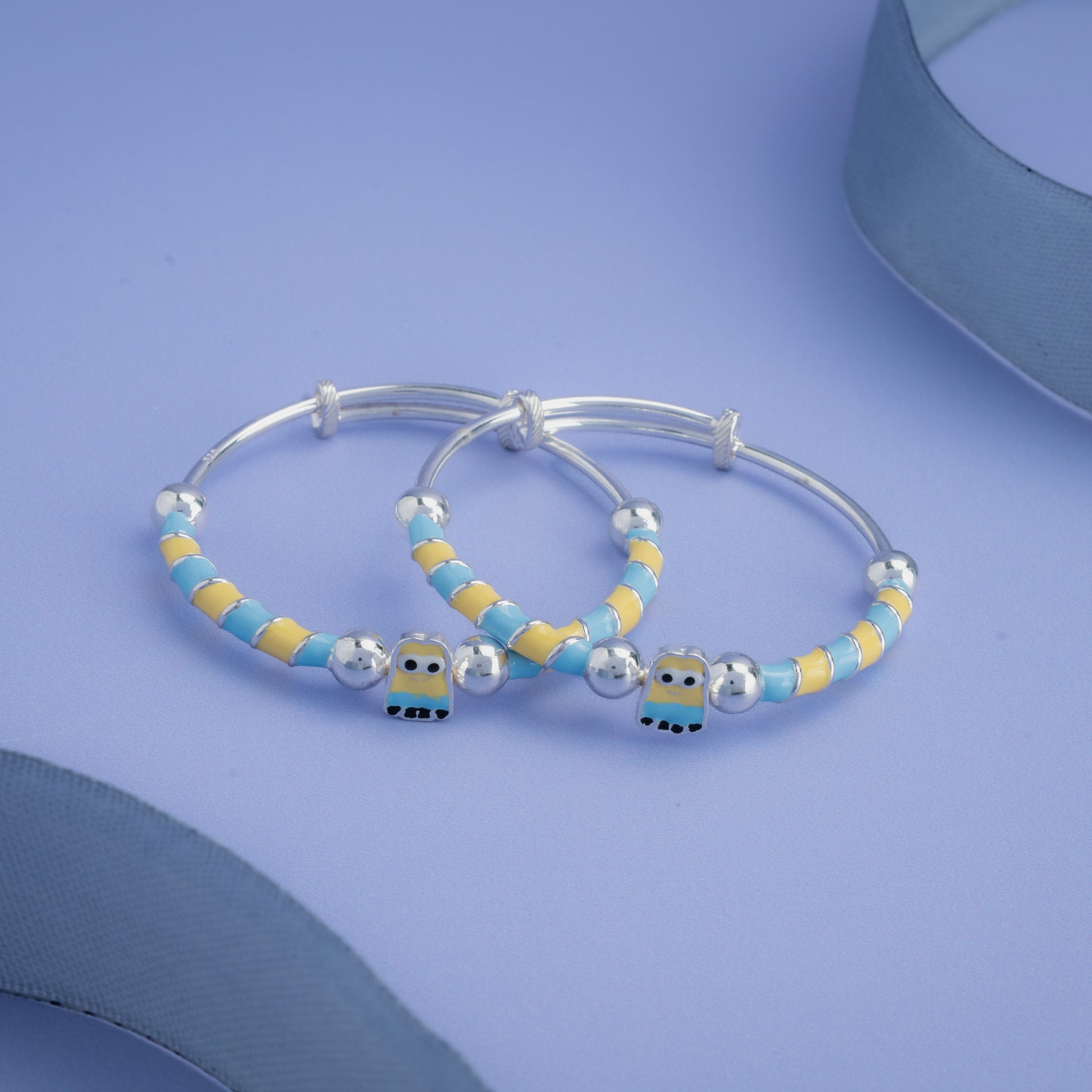 Adjustable baby anklet featuring cute cartoon motif
