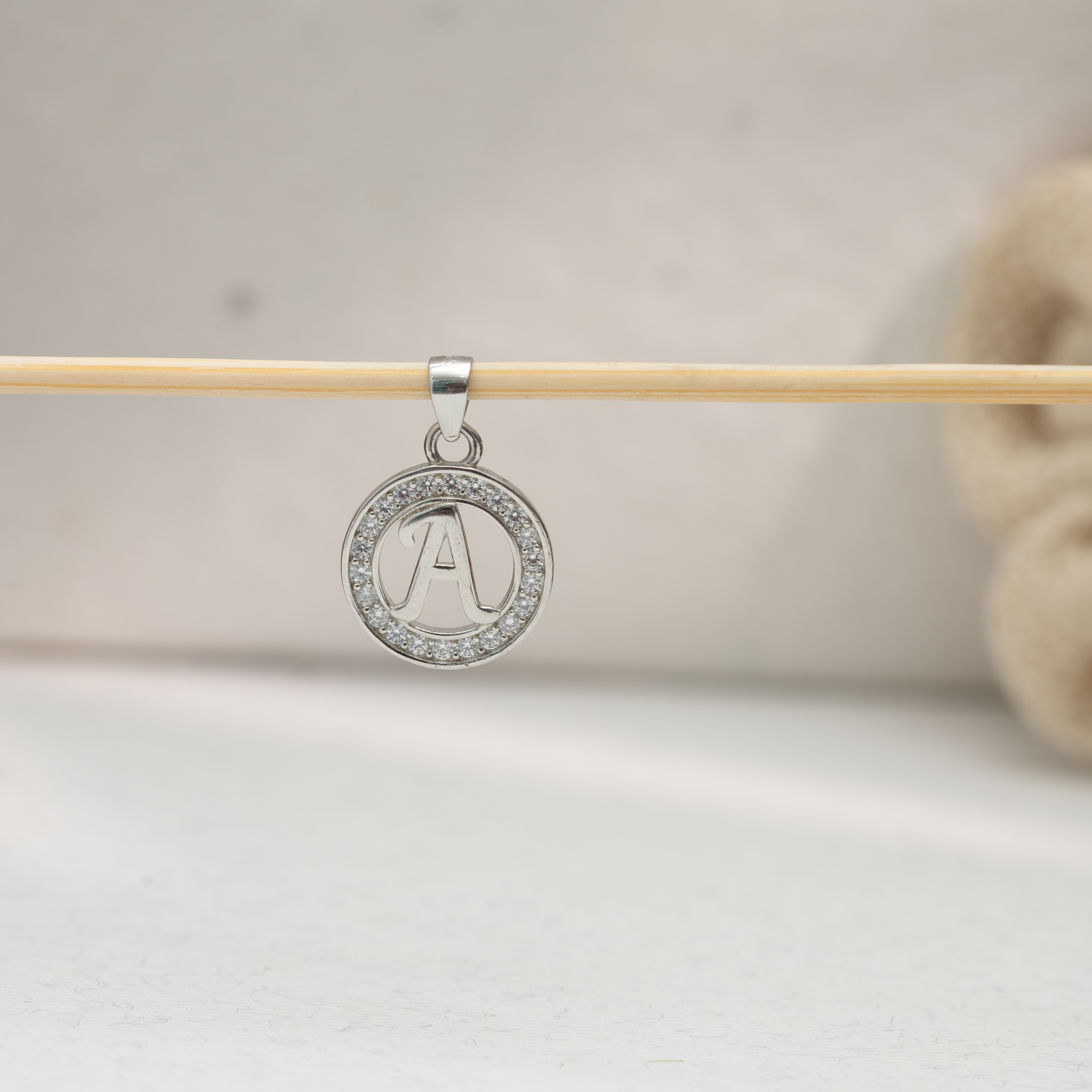 Alphabet A silver pendant with stone border