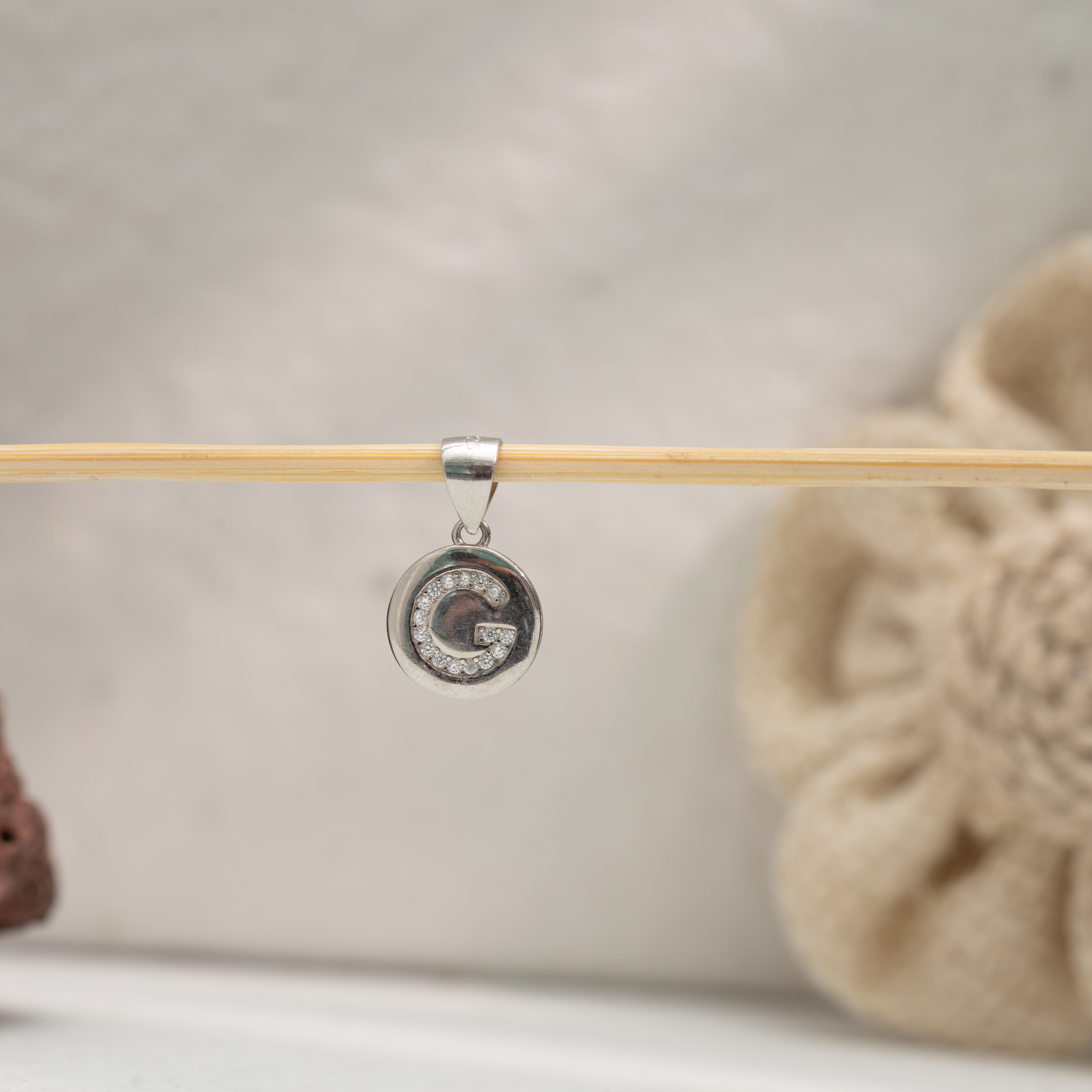 Alphabet G silver pendant with stones