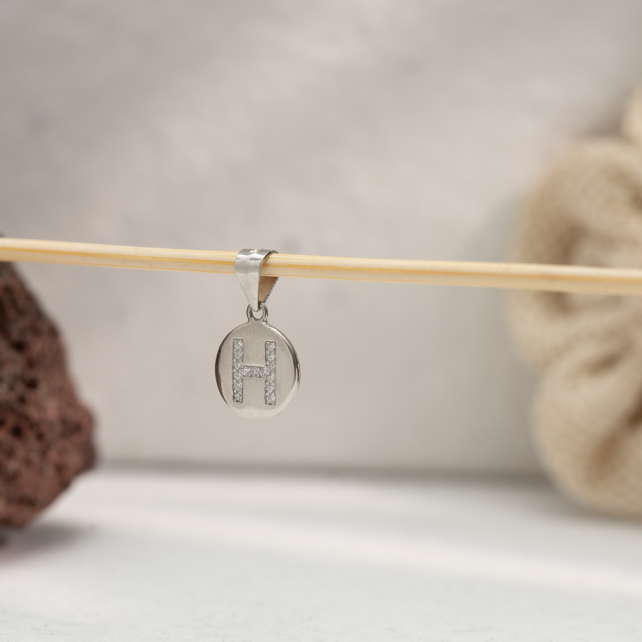 Alphabet H silver pendant with stones
