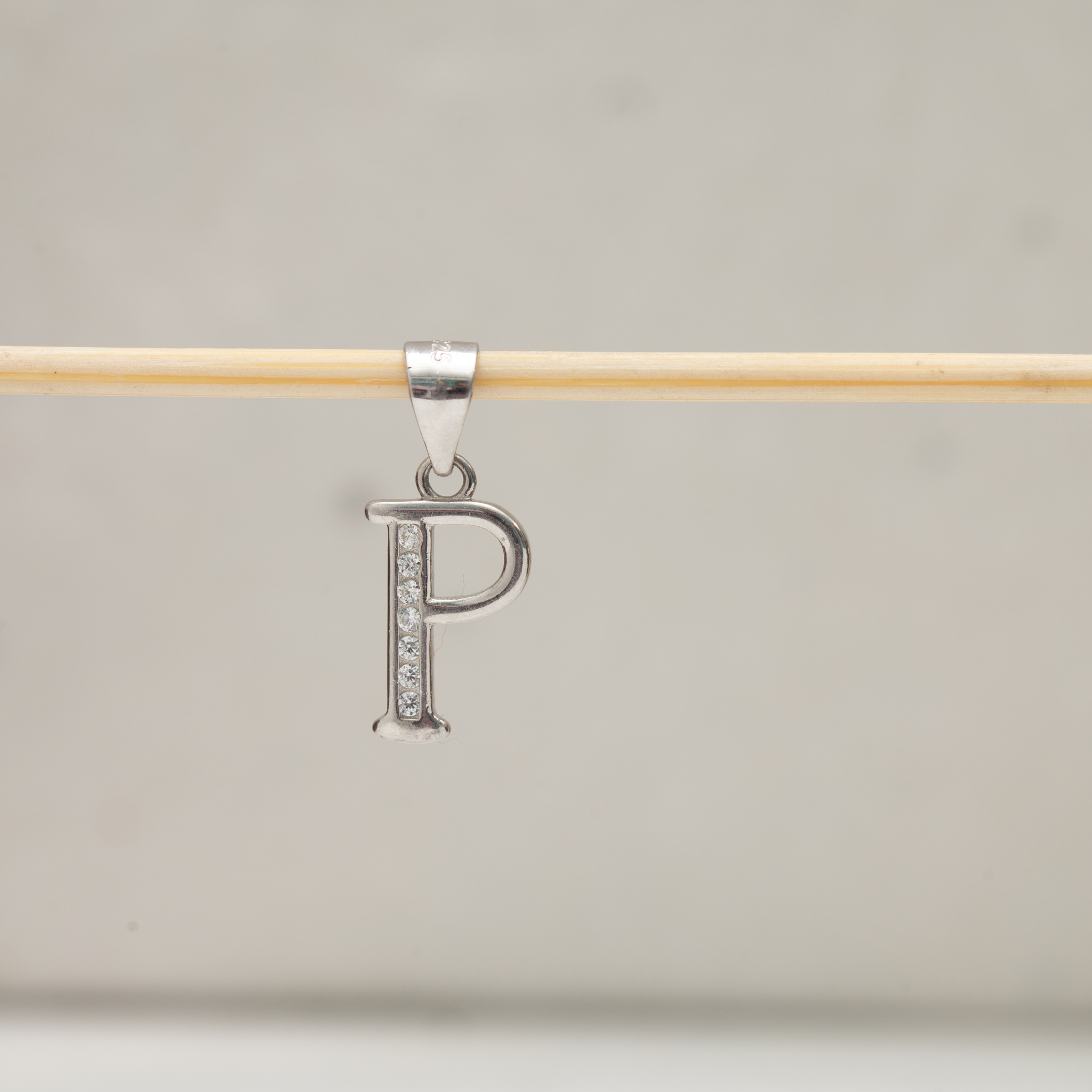 Alphabet P silver pendant with stones