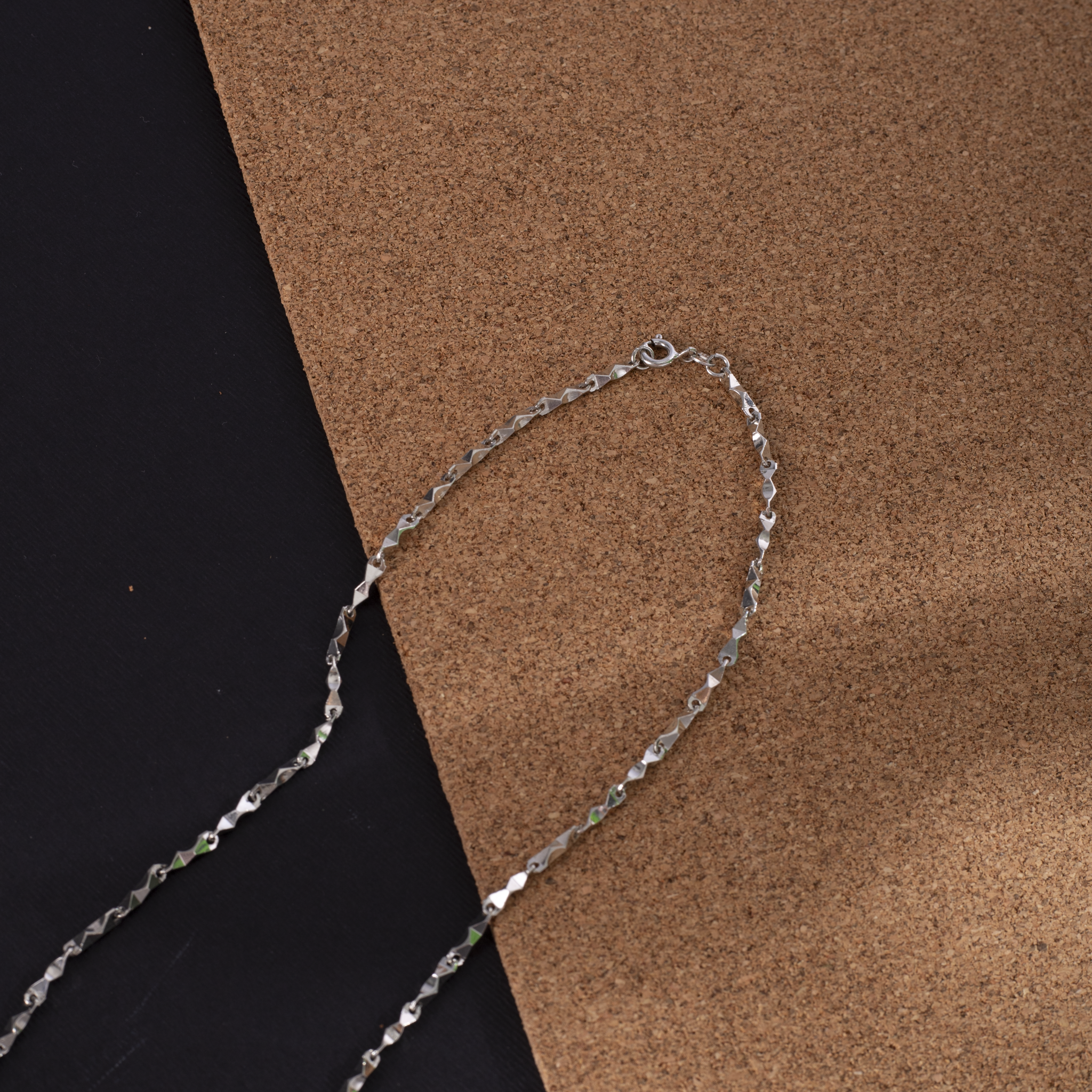 Angular twist sterling silver chain