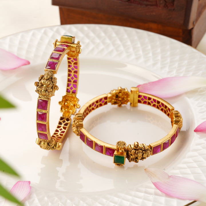 Antique Gold-Plated Bangle with Goddess Lakshmi Motif and Ruby Stones