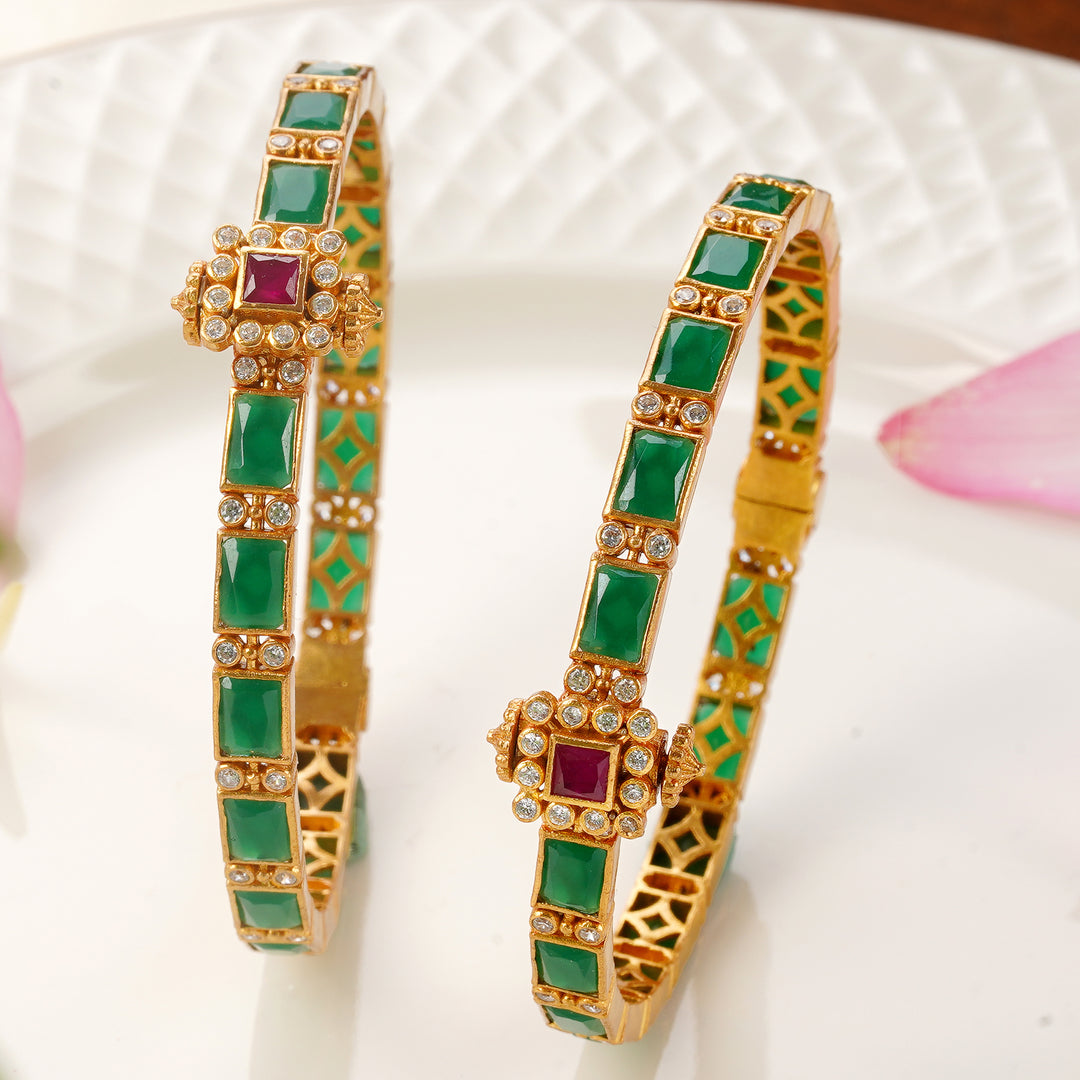 Antique emerald bangles with ruby and white stone design