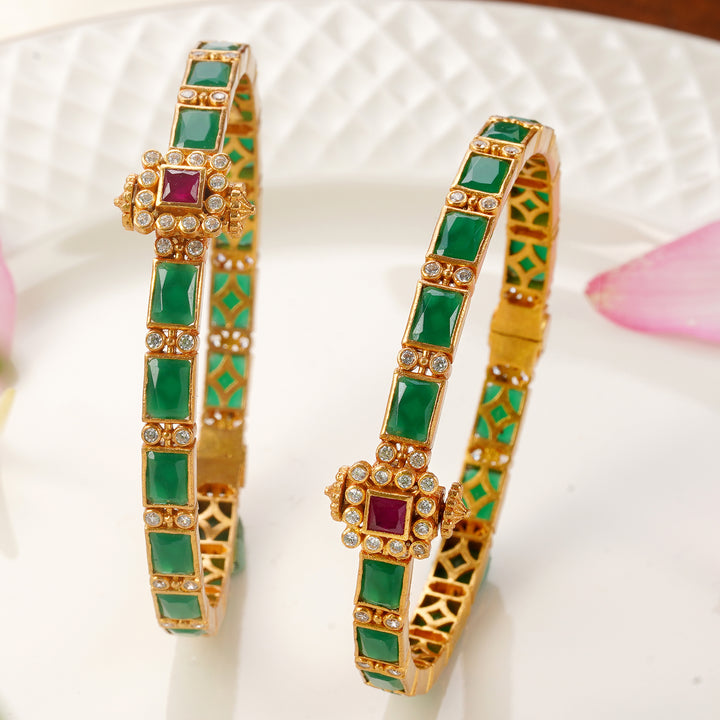 Antique emerald bangles with ruby and white stone design