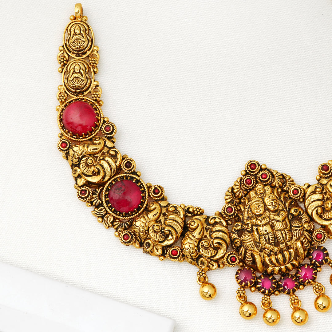 Antique gold necklace with ruby accents and pink beads