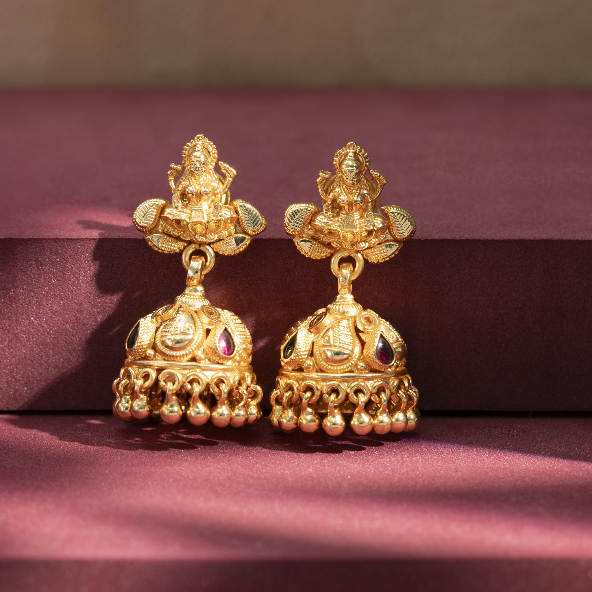 Antique gold plated Lakshmi jhumka earrings
