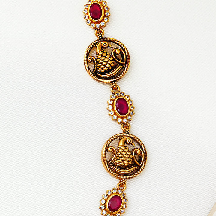 Antique gold short necklace with engraved peacocks and ruby floral charms