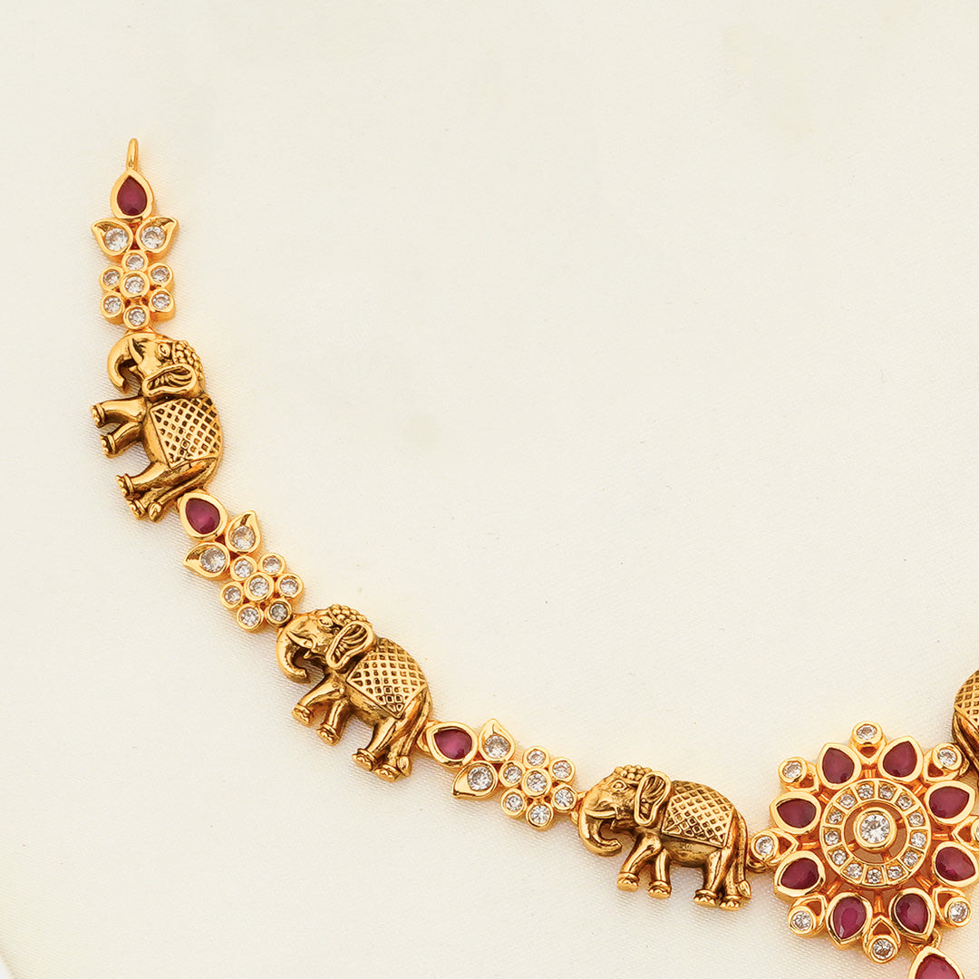 Antique gold temple jewellery set with Lakshmi pendant and pearls