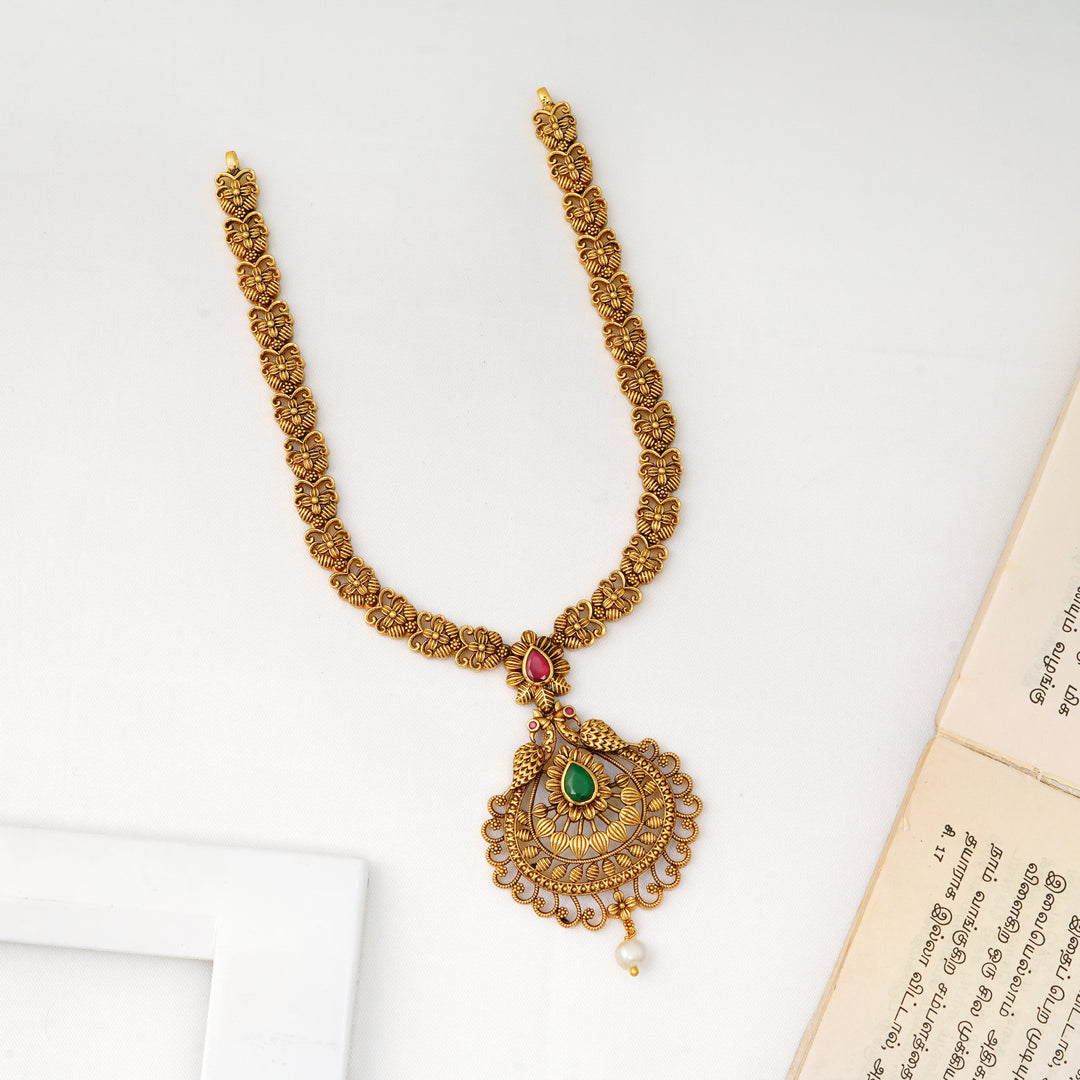 Antique peacock design necklace with emerald ruby pendant and pearl drop