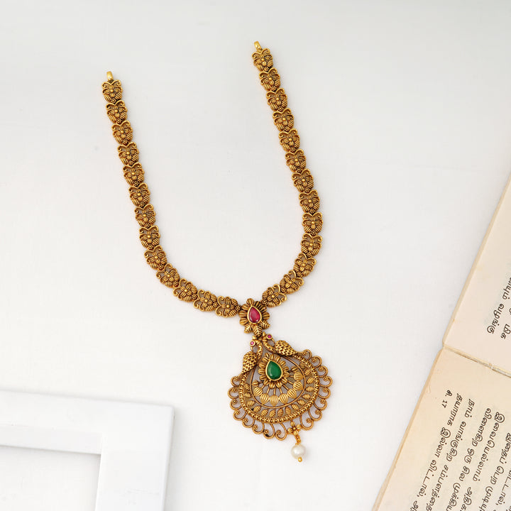Antique peacock design necklace with emerald ruby pendant and pearl drop