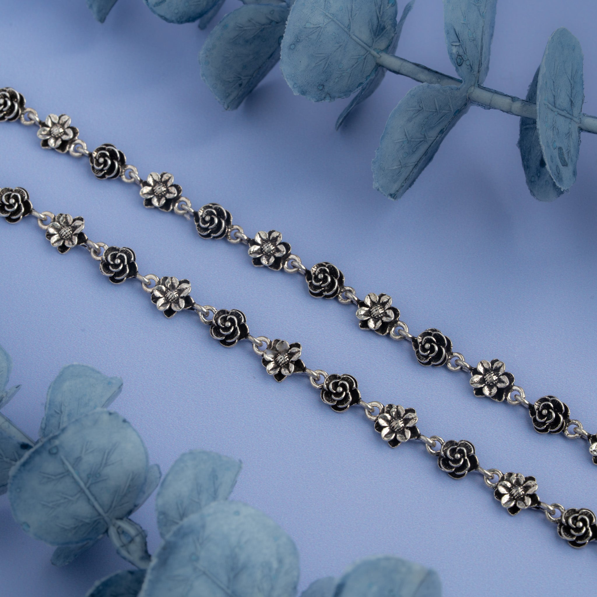 Antique silver floral anklet with rose and flower motifs
