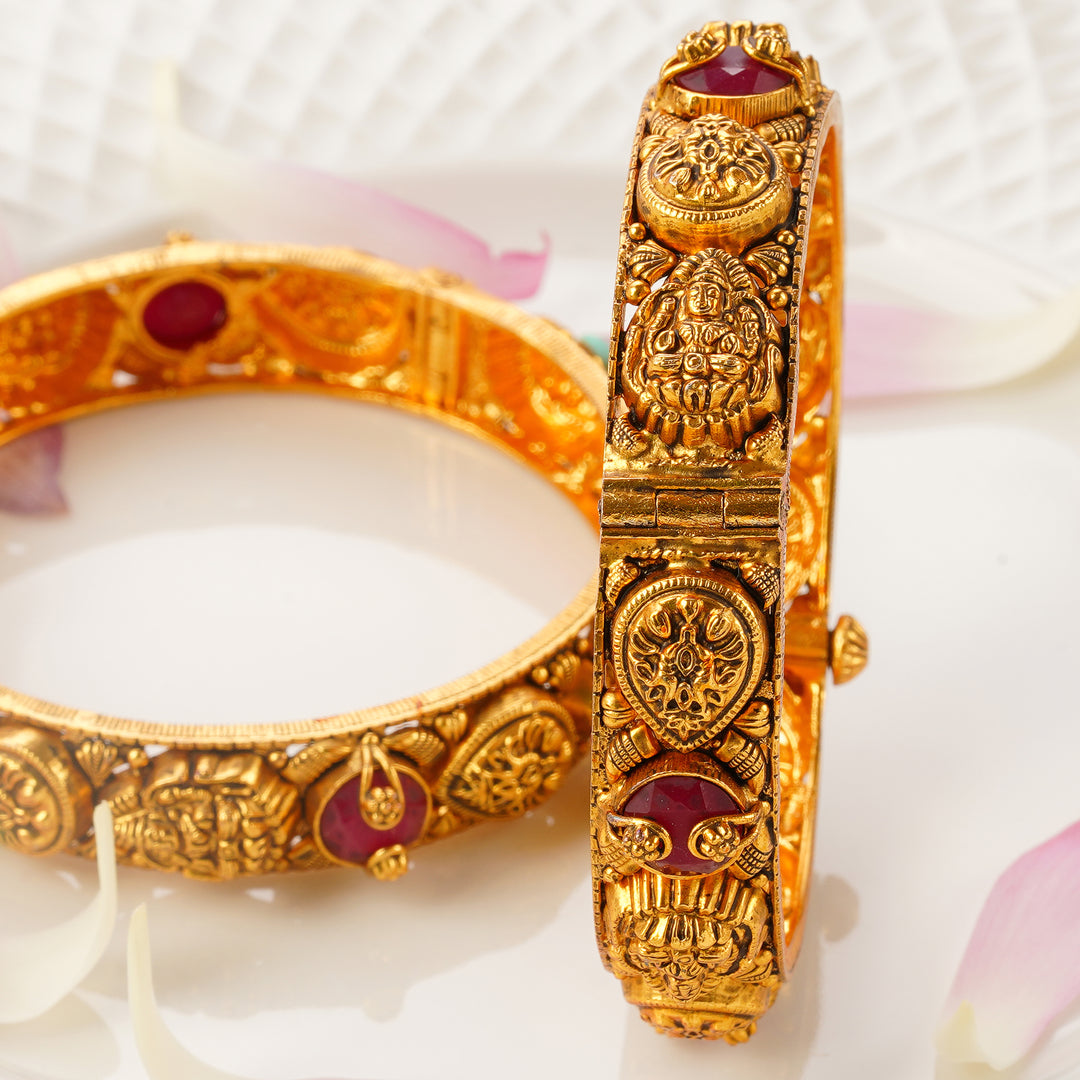 Antique temple jewellery bangles with Lakshmi motifs and ruby stones