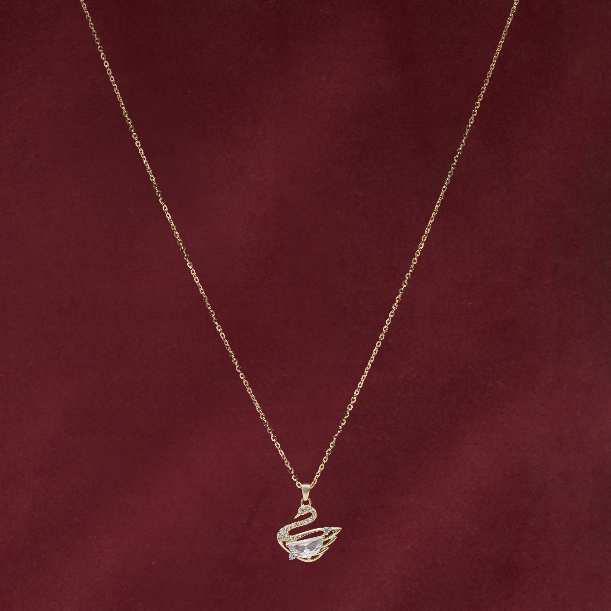 Bird-inspired gold-plated swan necklace design