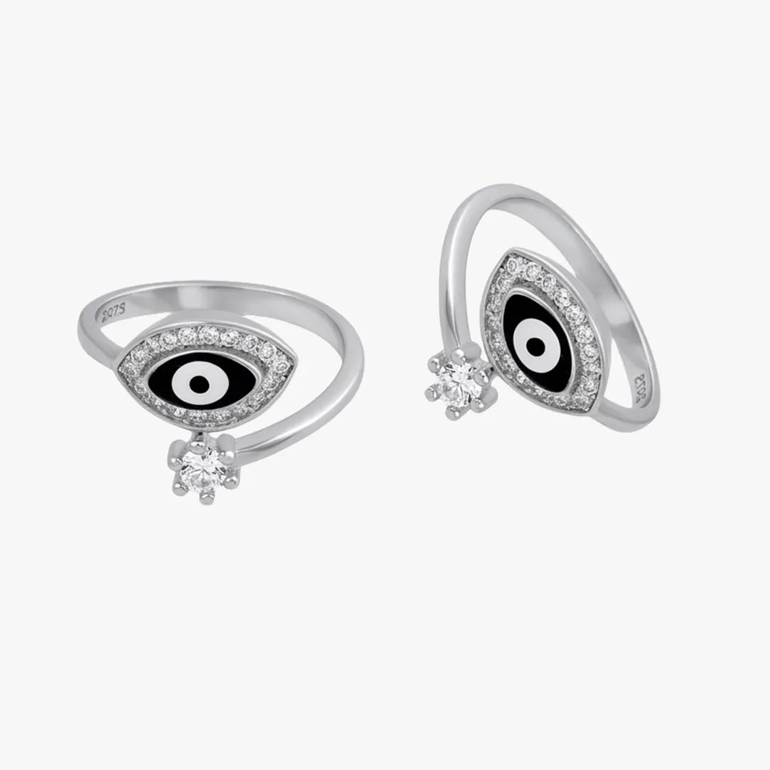 Black evil eye metti with stone border