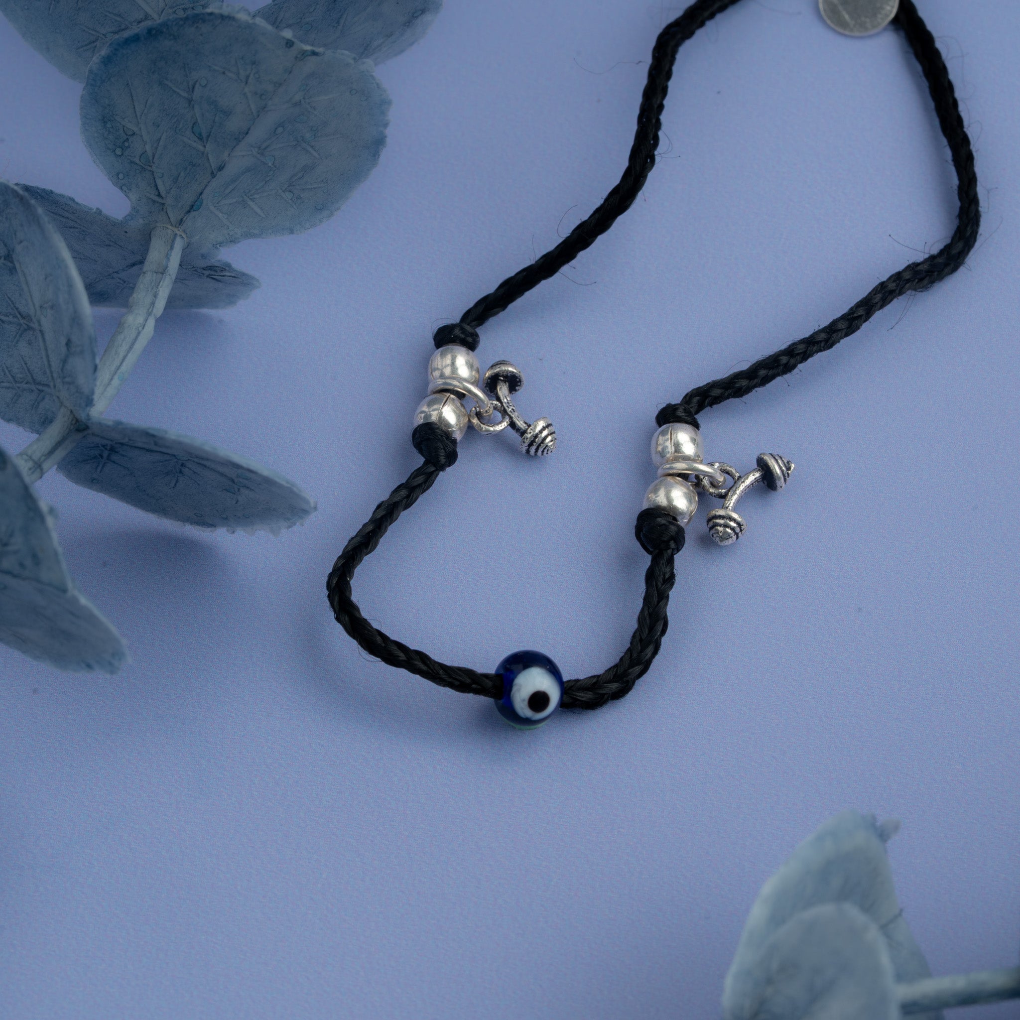 Black thread Anklet with oxidised silver dumbbell charms and blue evil eye bead