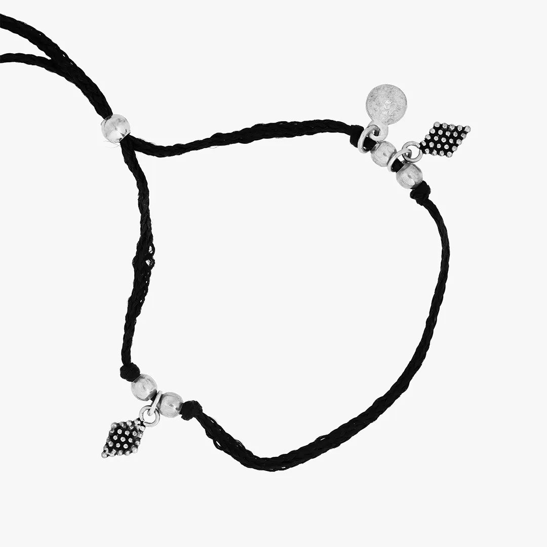 Black thread bracelet with silver charms