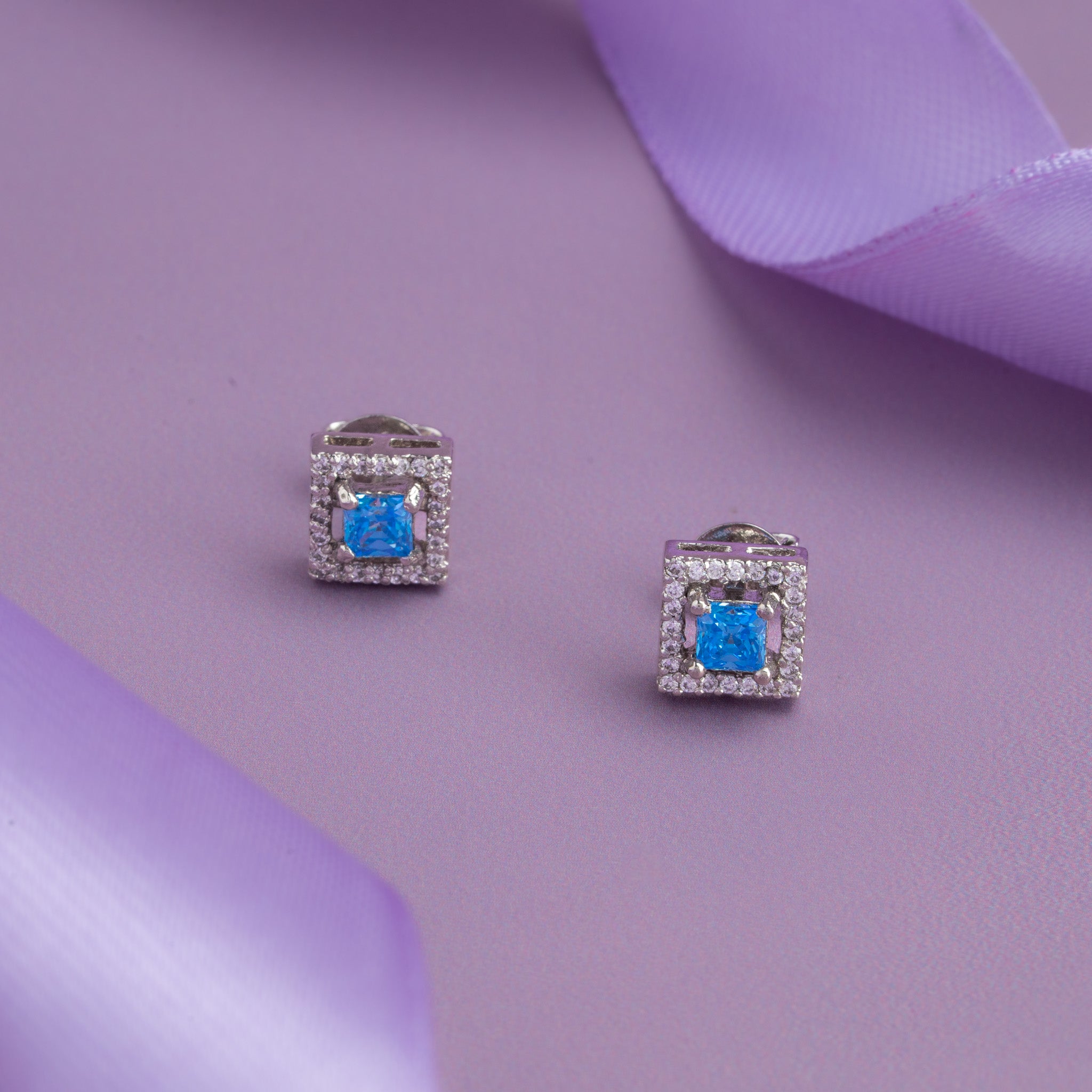 Blue stone square shaped silver stud
