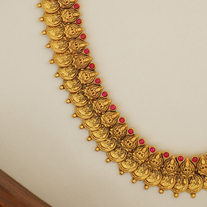 Bridal gold haram with goddess Lakshmi and ruby stones