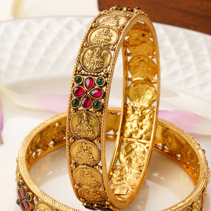 Bridal gold plated bangles design with goddess motifs