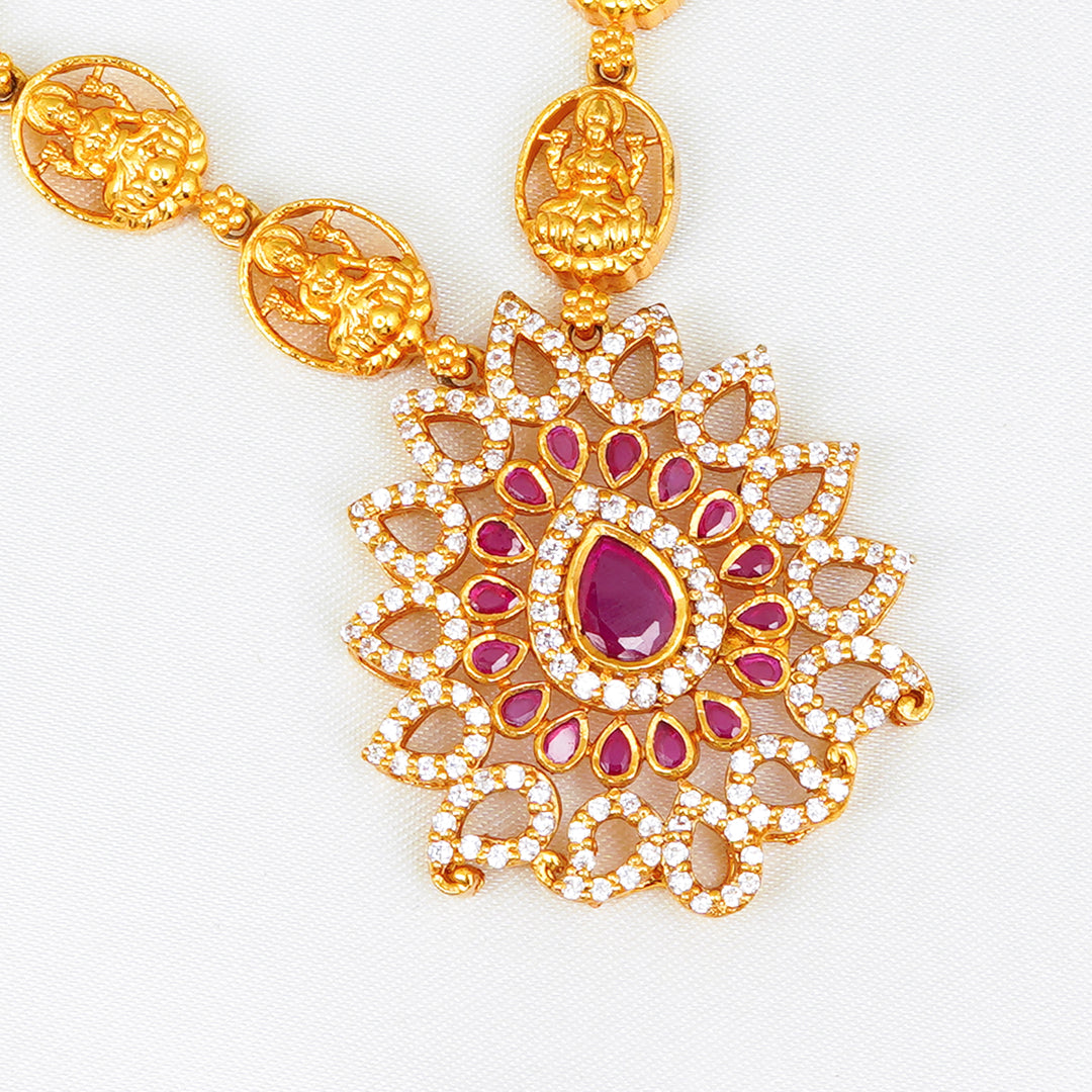 Bridal ruby necklace with antique Lakshmi pendant and traditional detailing