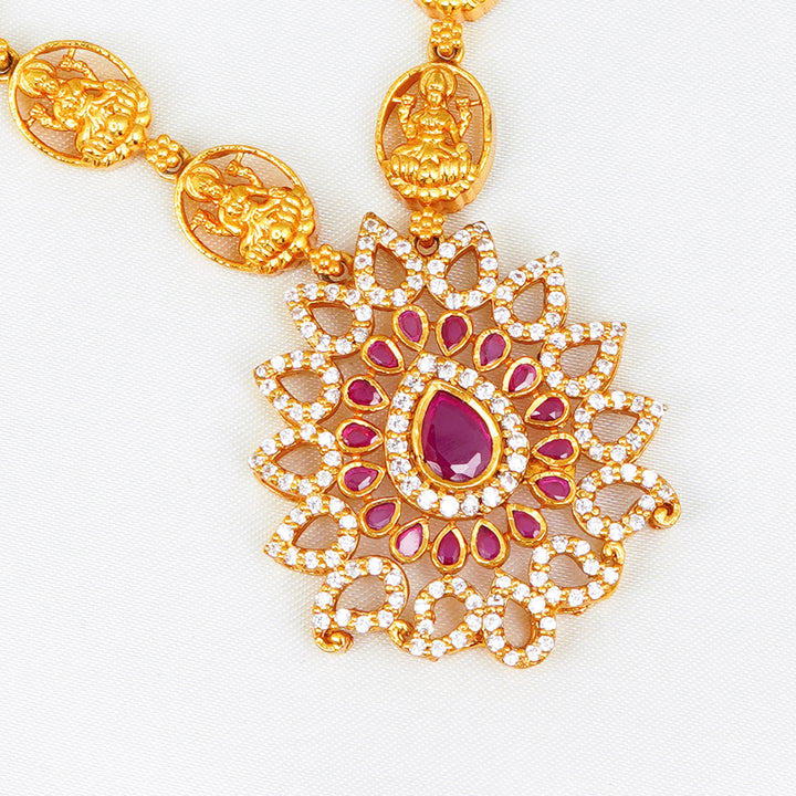 Bridal ruby necklace with antique Lakshmi pendant and traditional detailing