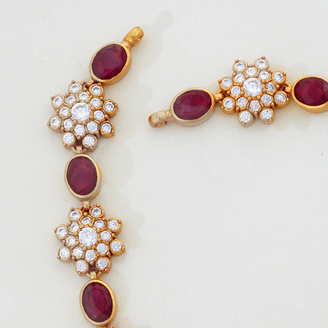 Bridal ruby necklace with round floral pendant