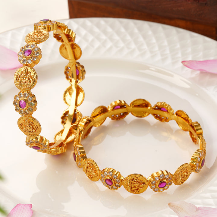 Buy screw type gold bangles online with Lakshmi Nagas floral design