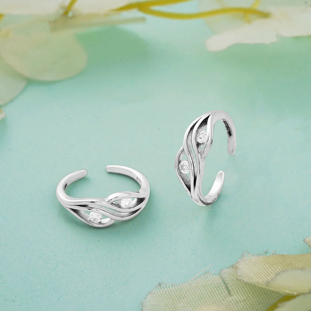 Curved leaf pattern toe ring pair in silver