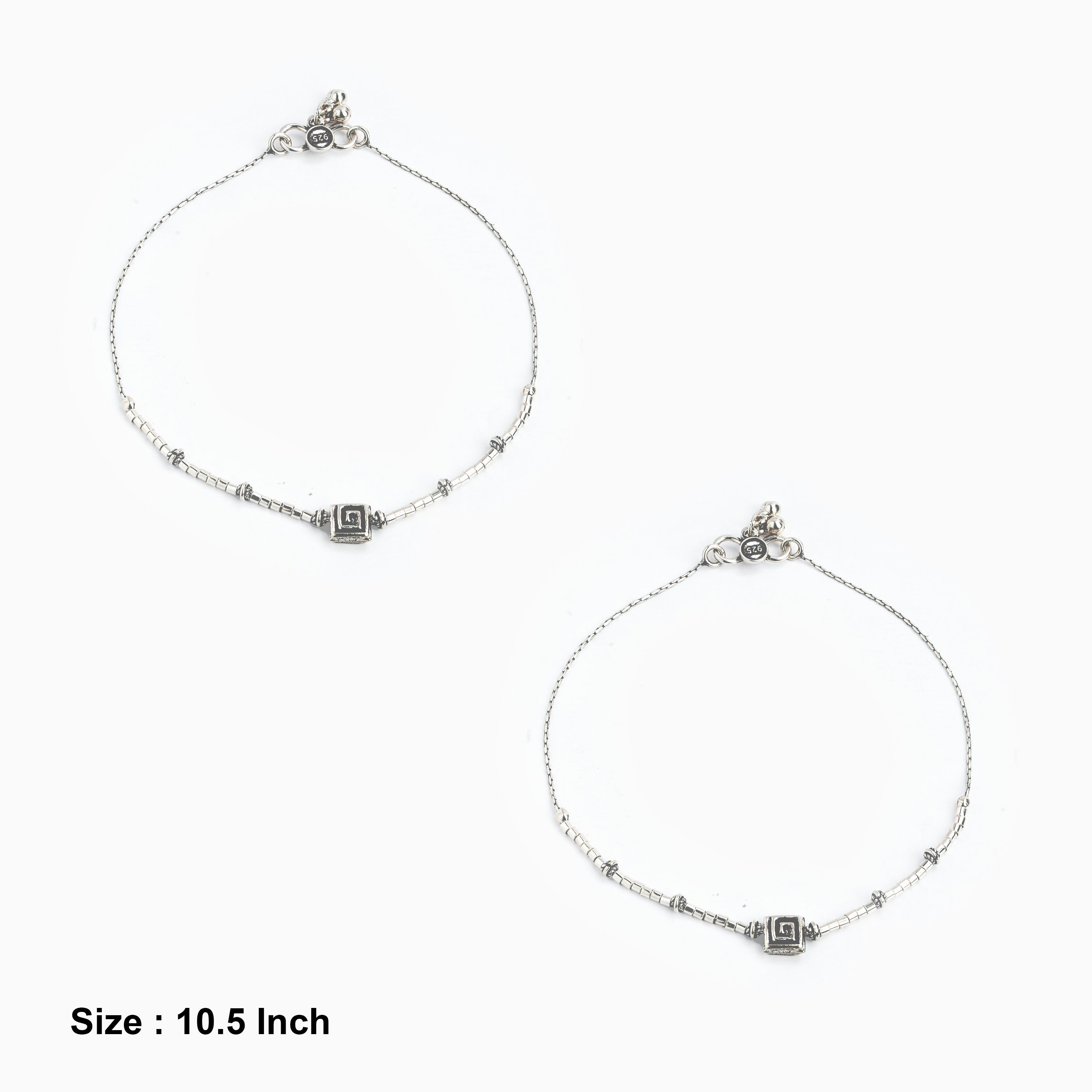 Cylindrical beads with Greek key square motifs