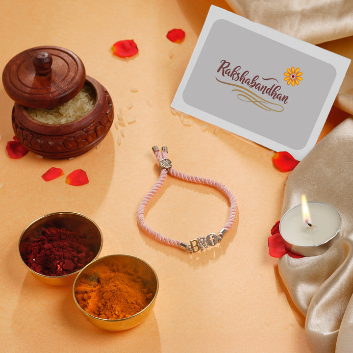 Designer Pink Thread Sterling Silver Rakhi