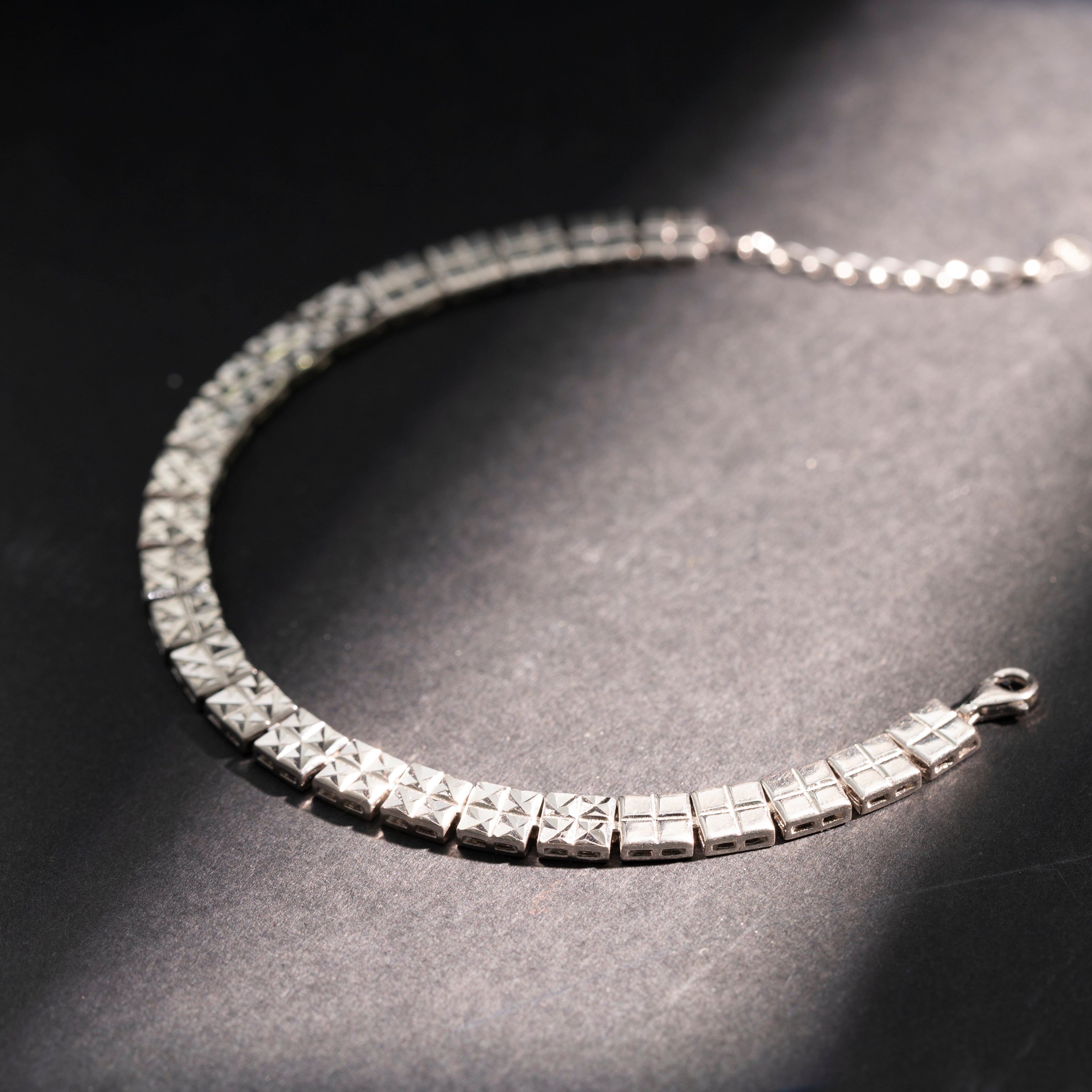 Diamond-cut textured silver bracelet design