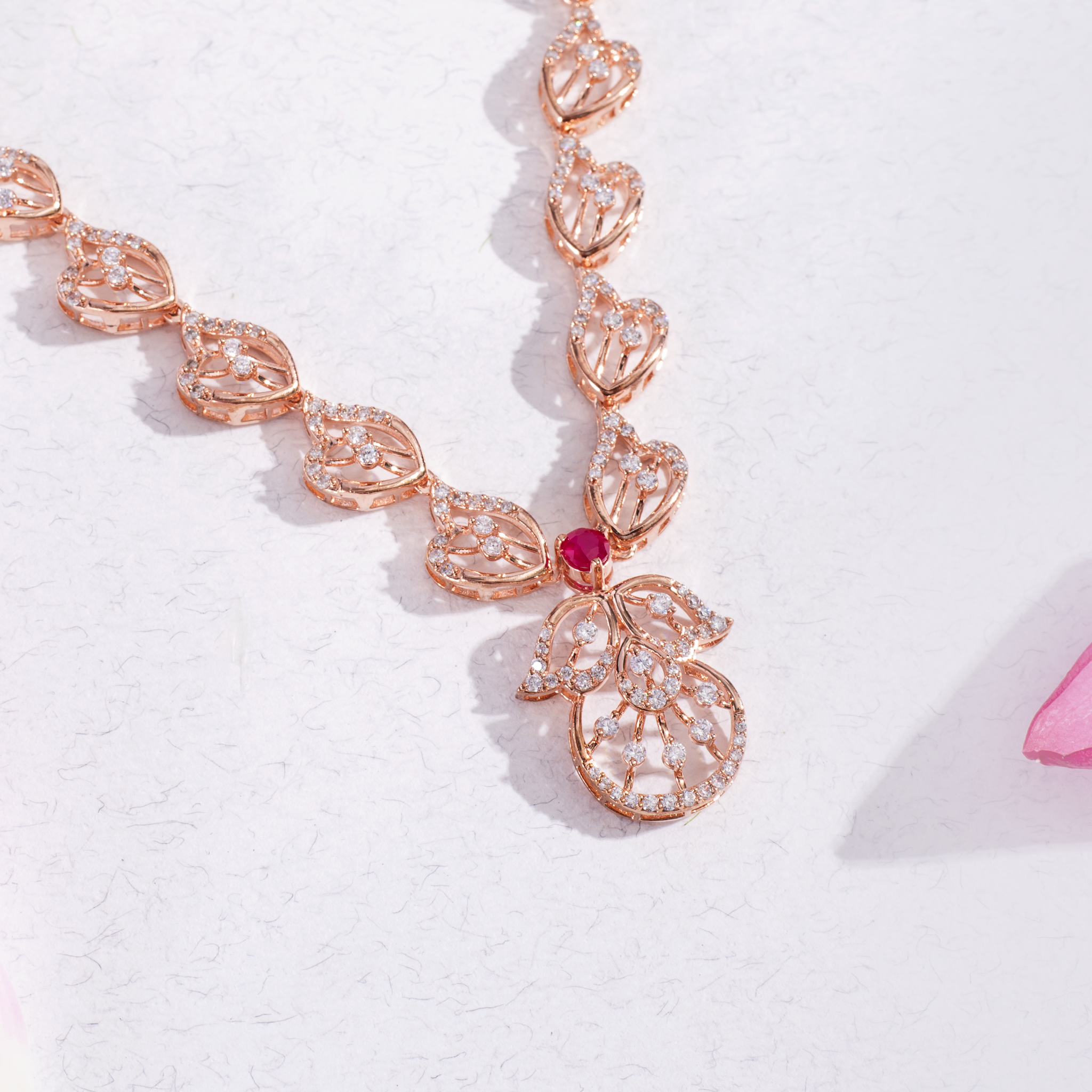 Elegant Crystal Leaf Necklace Set in Rose Gold Ishna