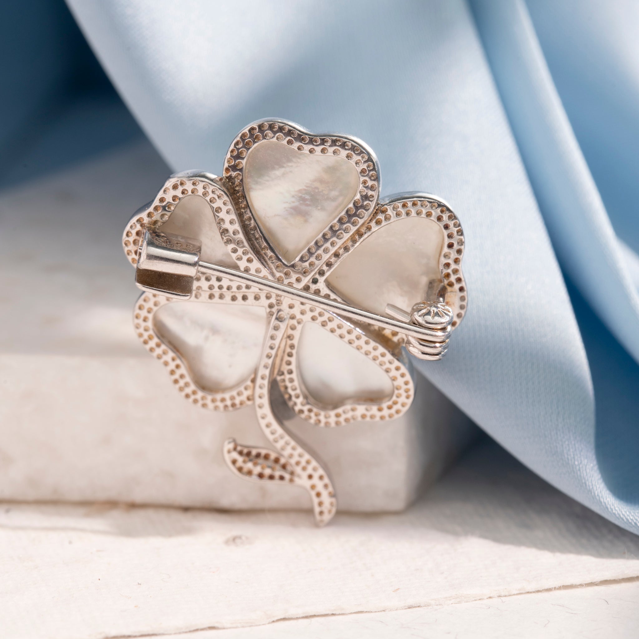 Elegant floral mother of pearl brooch