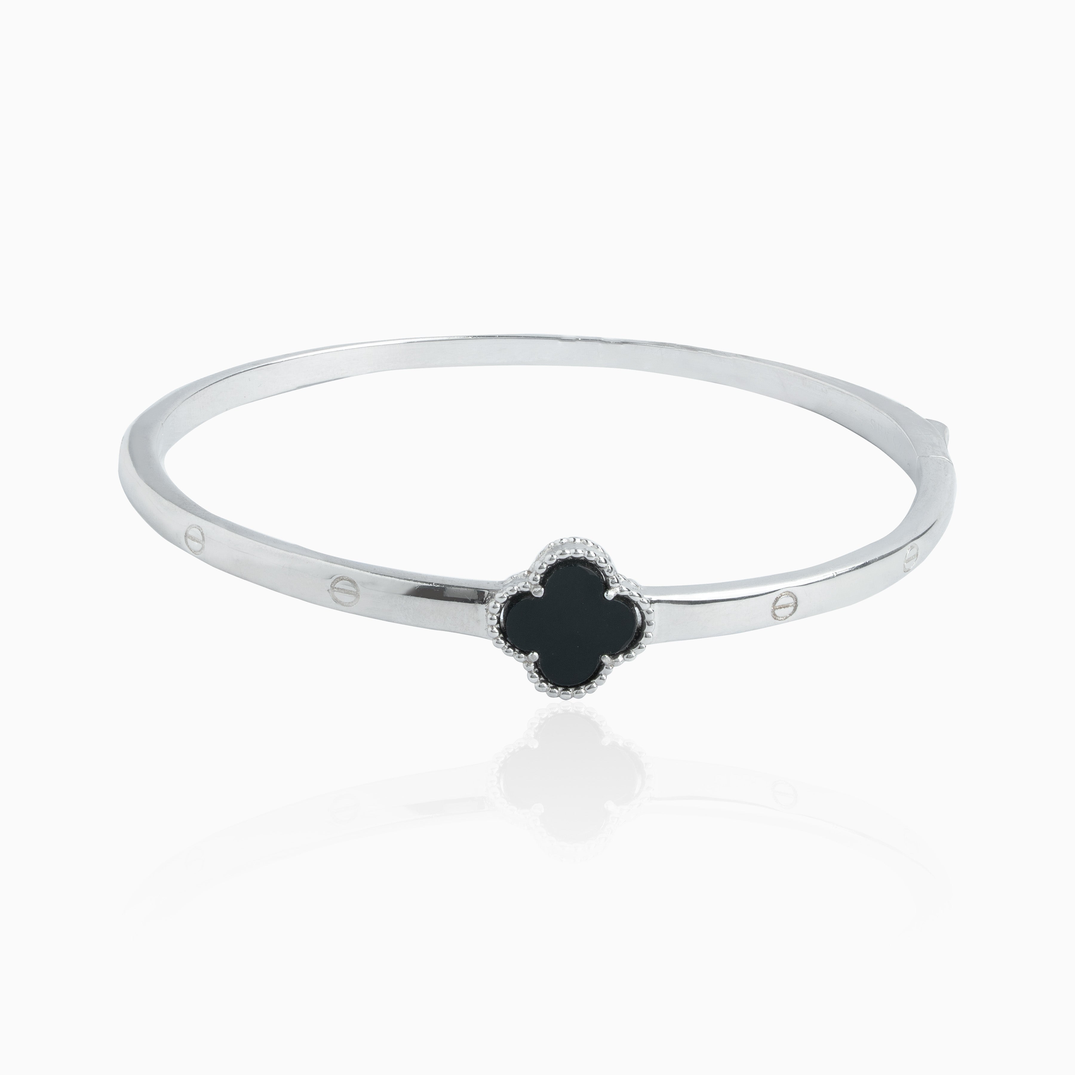Elegant silver bangle with black enamel clover