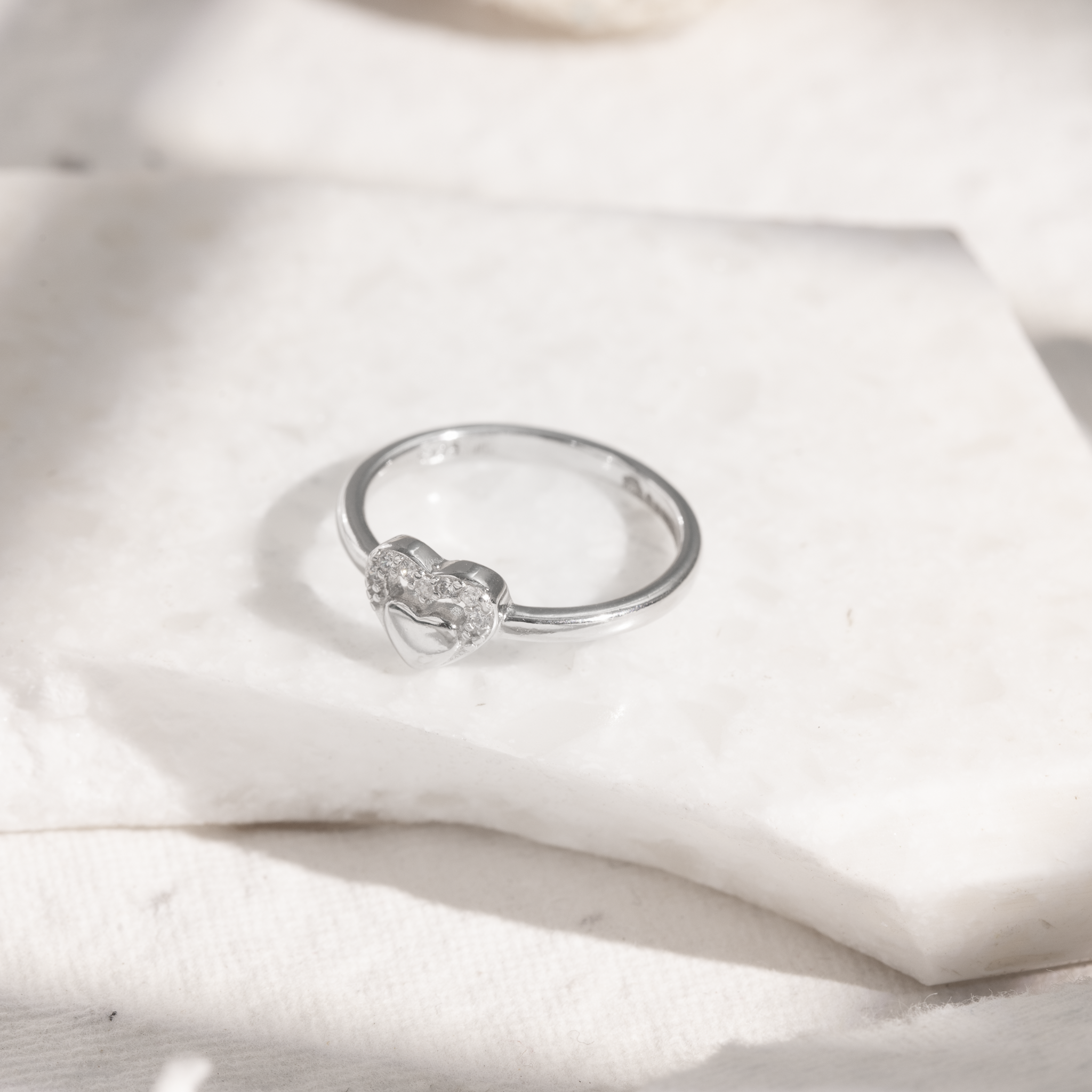 Elegant silver heart ring with sparkle