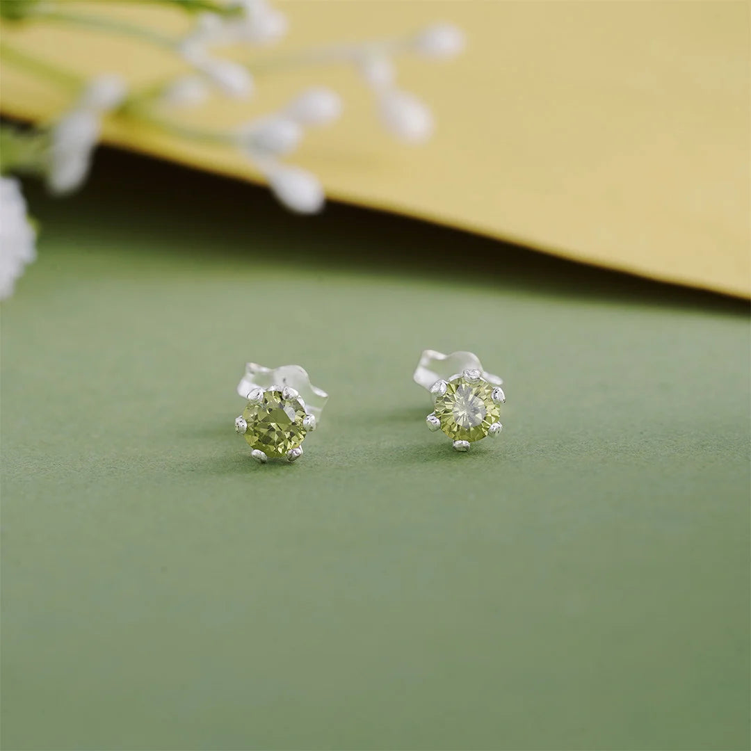Faceted green stud earrings