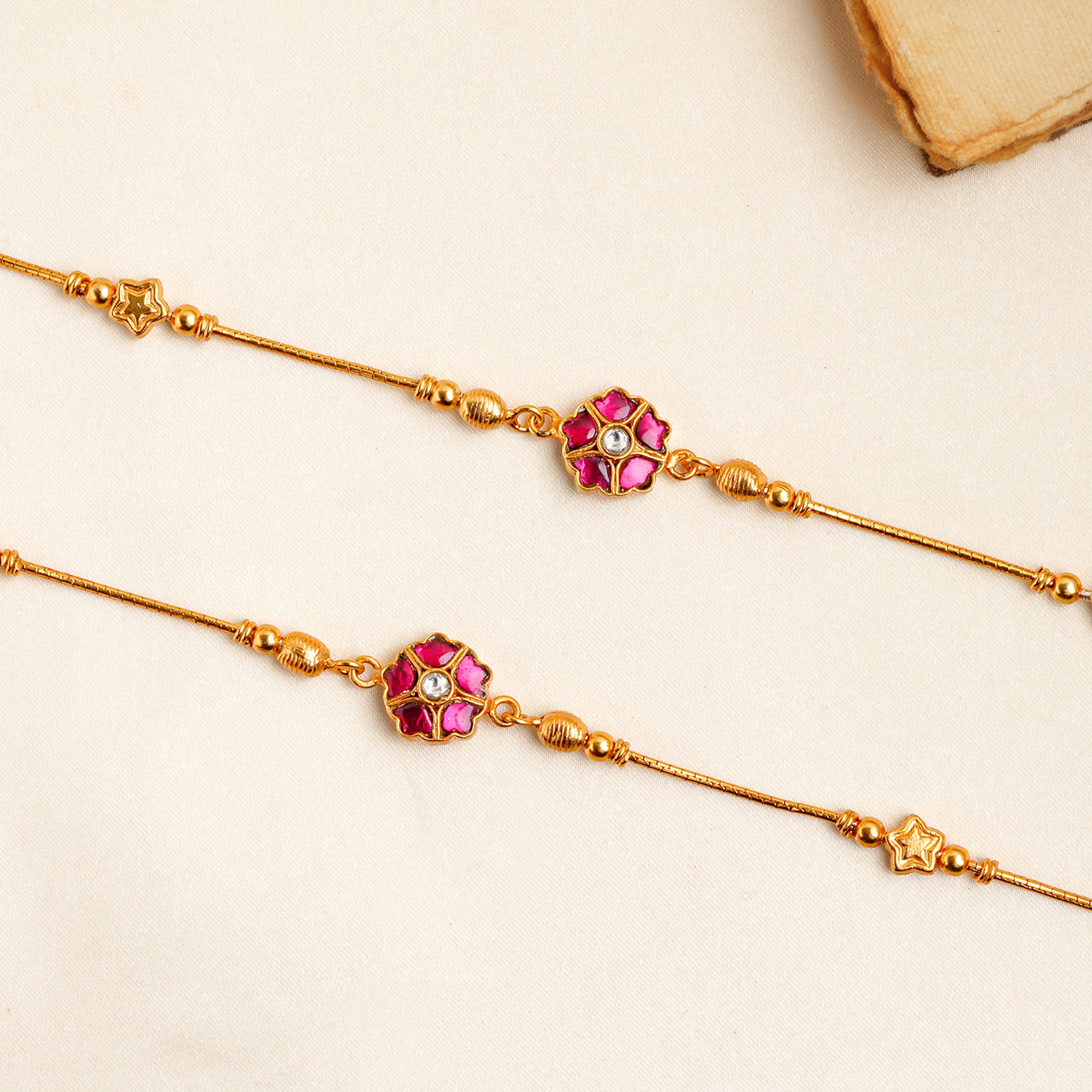 Floral motif gold plated ruby stone payal Ishna 