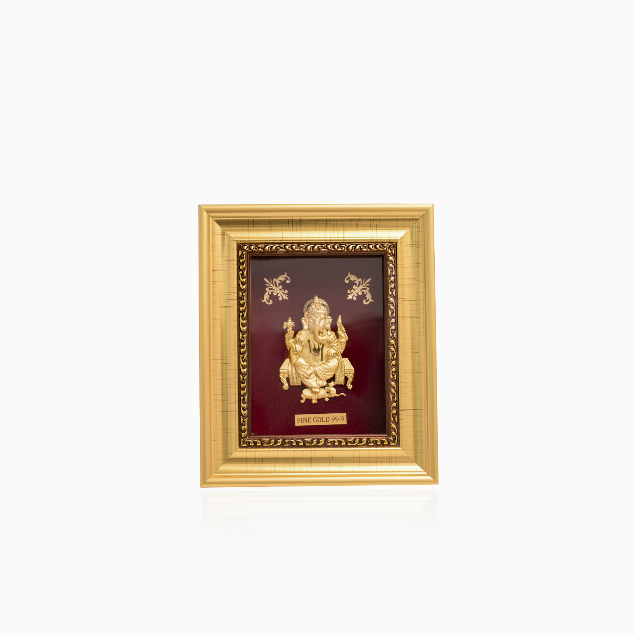 Ganesha pooja room gold frame décor