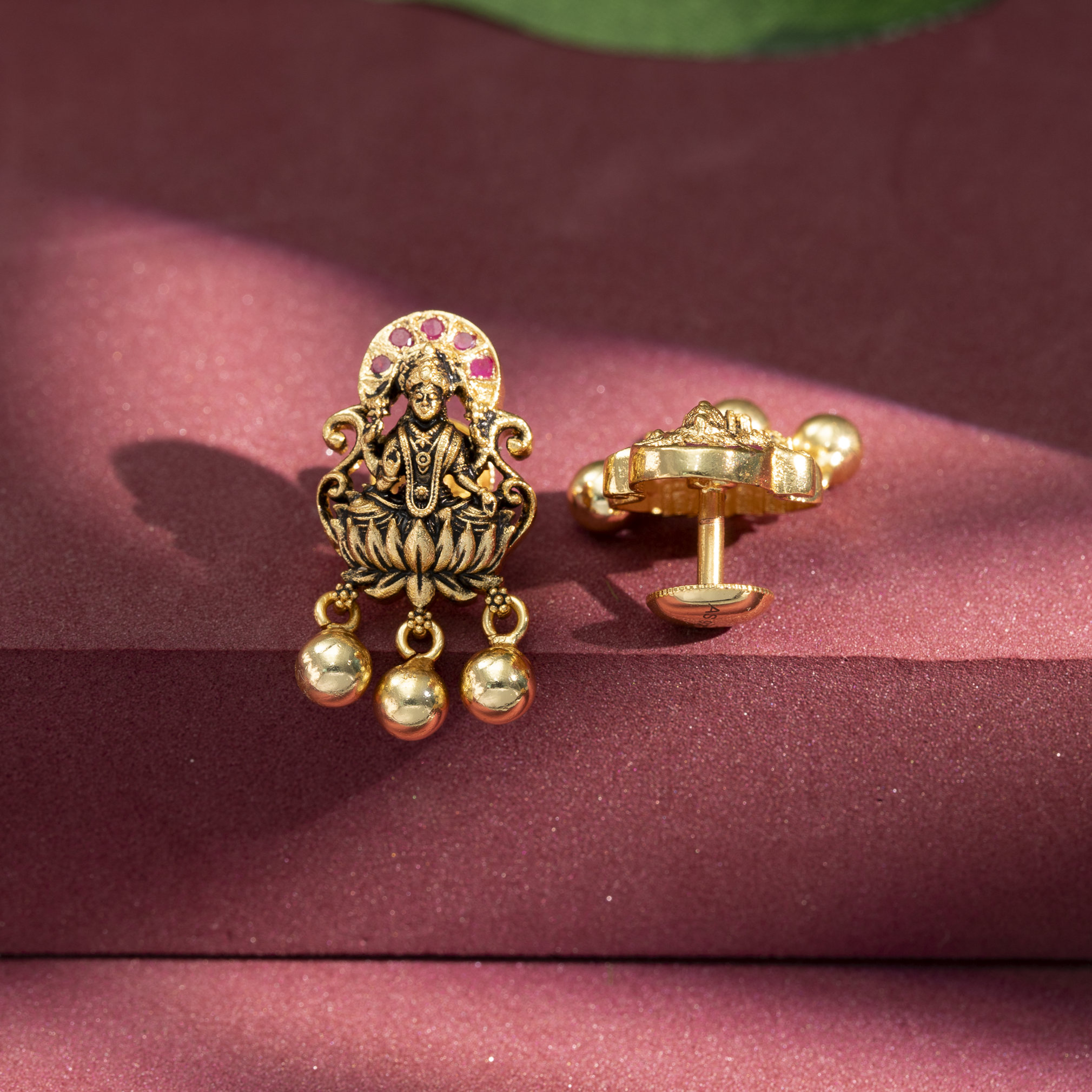 Goddess Lakshmi gold earrings with ruby stones