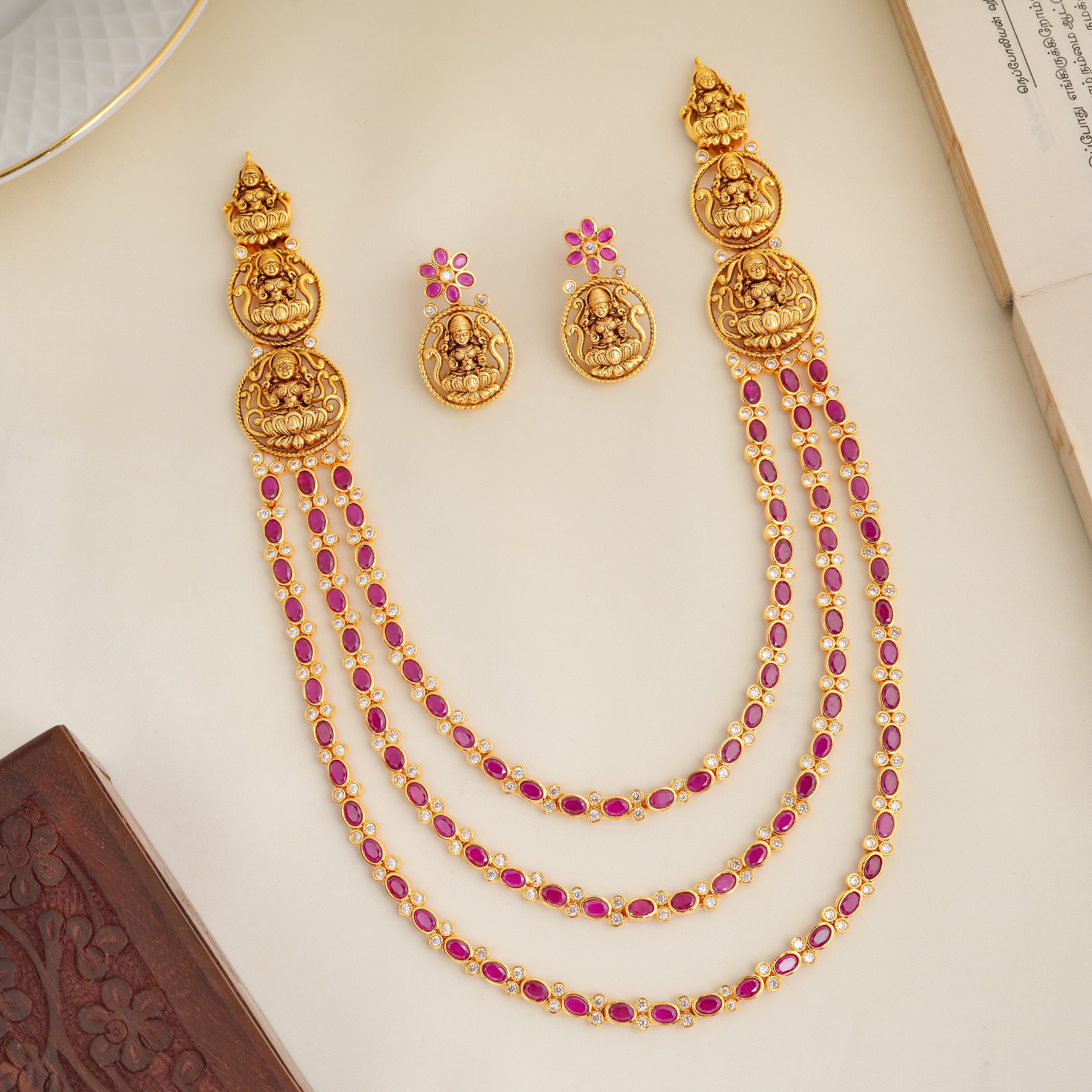 Gold-plated Lakshmi malai set with ruby stones