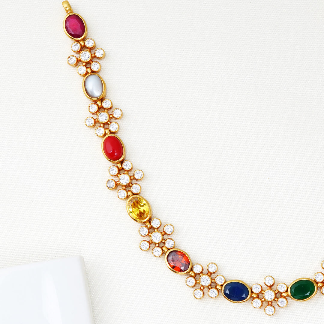 Gold-plated silver Navaratna necklace with vibrant gemstones and Swarovski stones