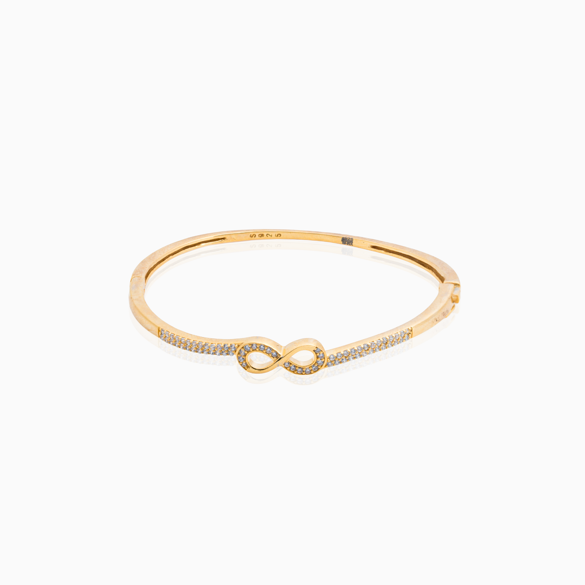 Gold infinity silver bracelet with stone detailing
