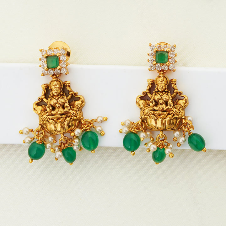 Gold plated Stud Lakshmi Motifs and Emerald Stones