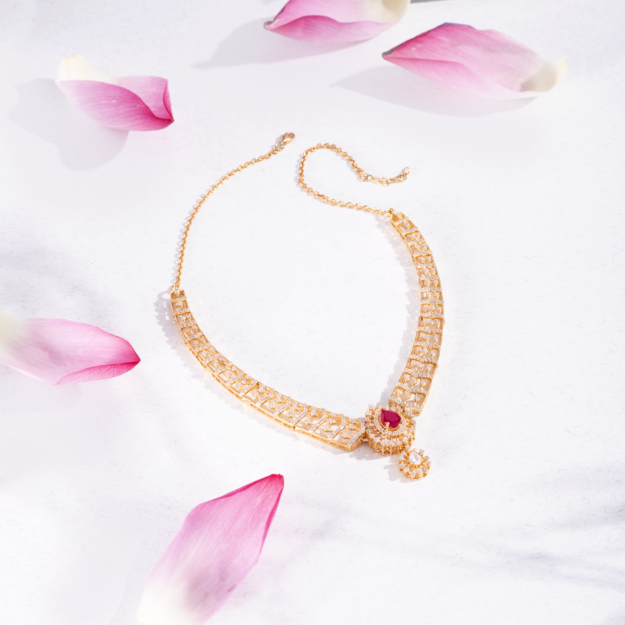 Gold plated ruby drop necklace set with earrings Ishna