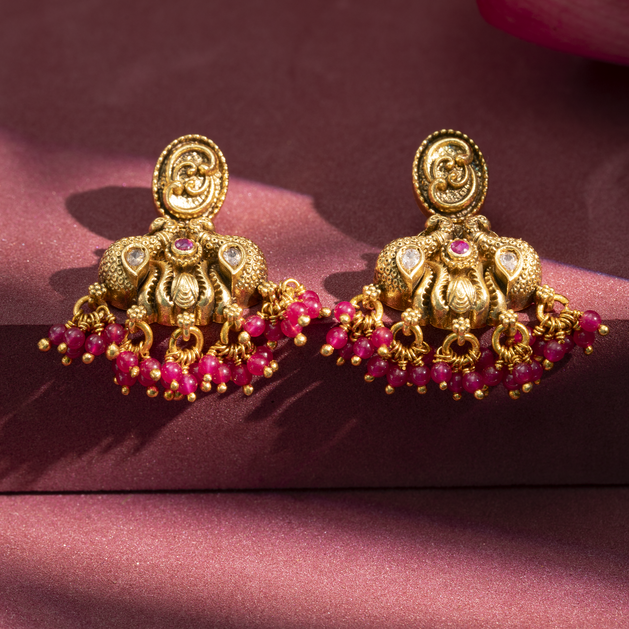 Gold plated temple jhumka earrings