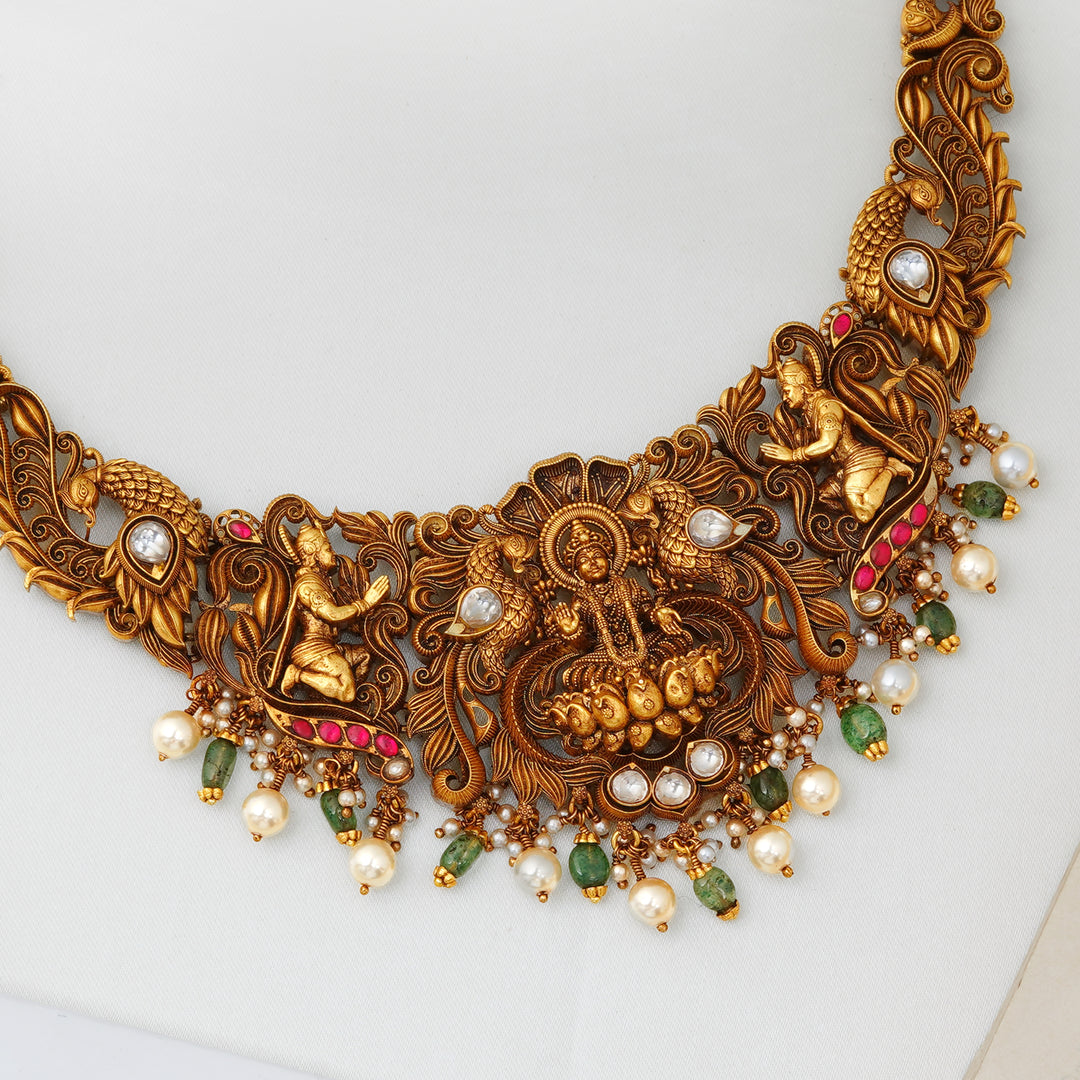 Handcrafted antique gold Lakshmi necklace for bridal wear