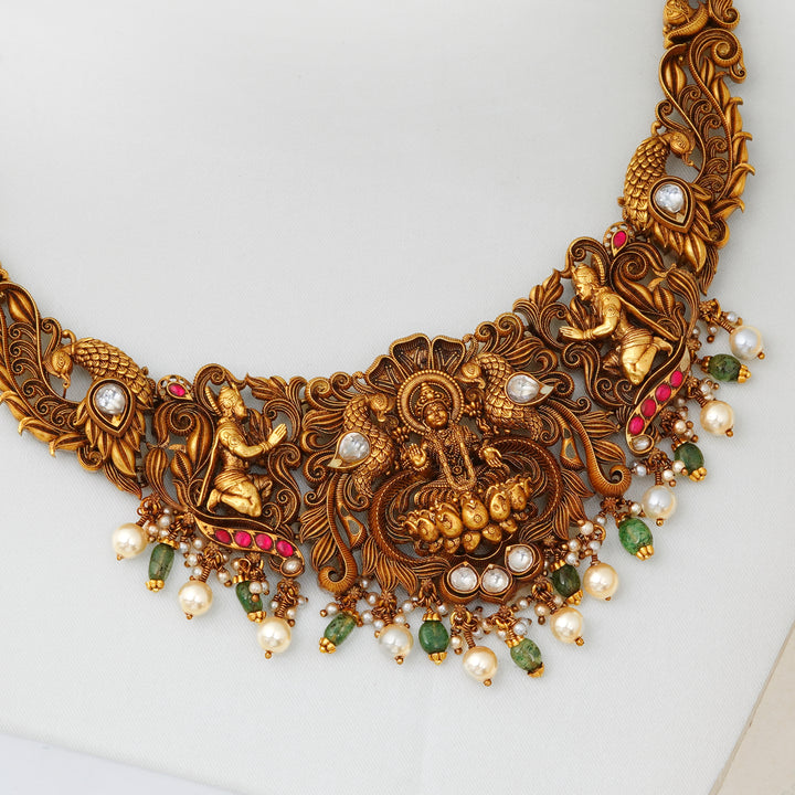 Handcrafted antique gold Lakshmi necklace for bridal wear