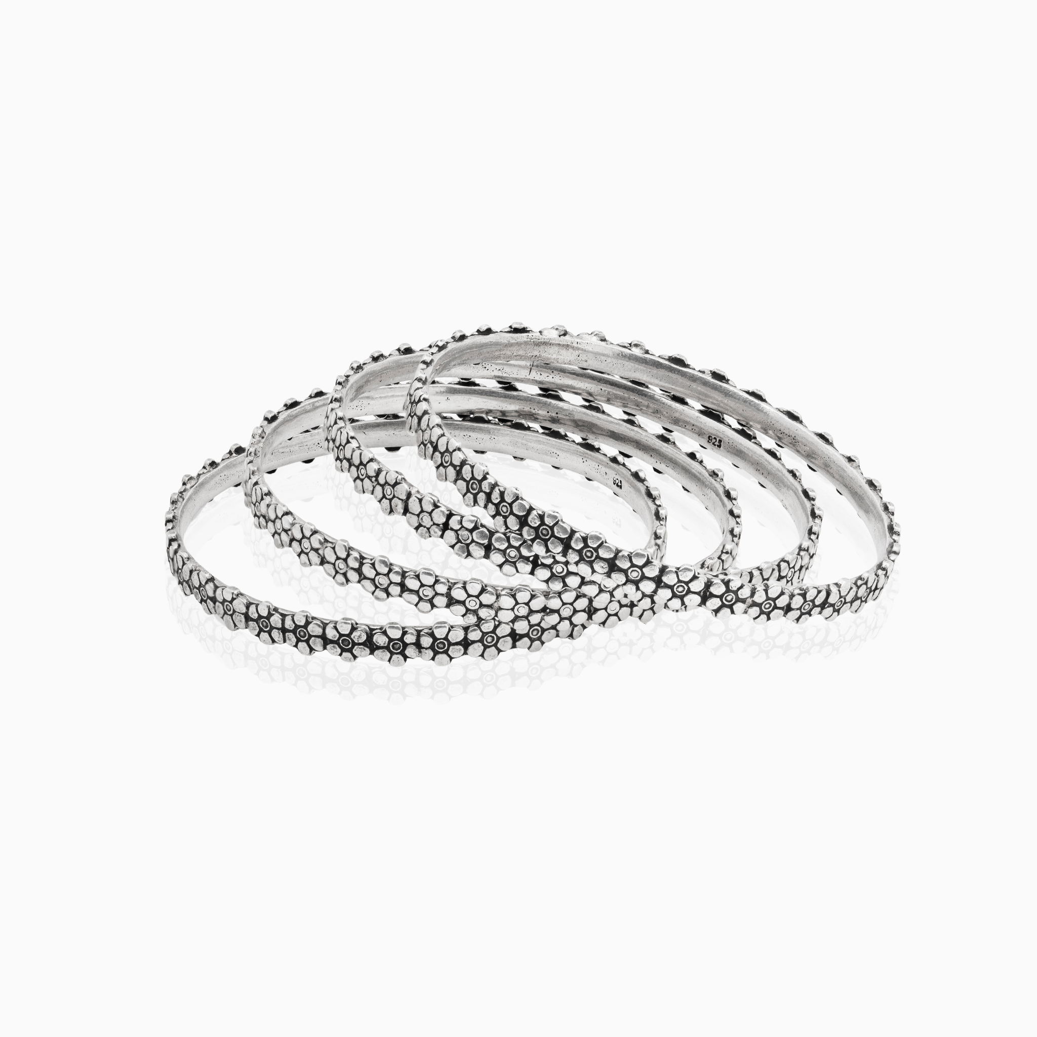 Handcrafted floral silver bangles
